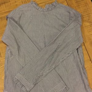 Blue and white striped blouse.